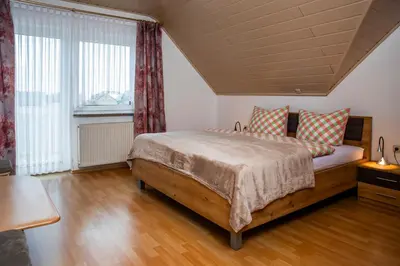 Ein Bett oder Betten in einem Zimmer der Unterkunft Ferienhaus Pauly