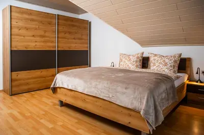 Ein Bett oder Betten in einem Zimmer der Unterkunft Ferienhaus Pauly