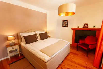Ein Bett oder Betten in einem Zimmer der Unterkunft B&B Echternacher Hof
