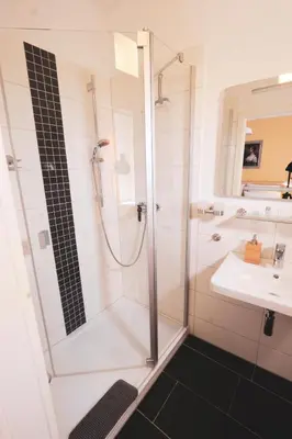 Ein Badezimmer in der Unterkunft B&B Echternacher Hof