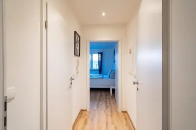 Ein Bett oder Betten in einem Zimmer der Unterkunft Cozy 2-room apartment with WiFi & SKY