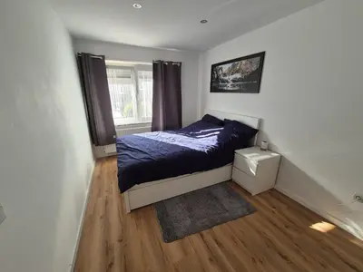 Ein Bett oder Betten in einem Zimmer der Unterkunft Kezara Living