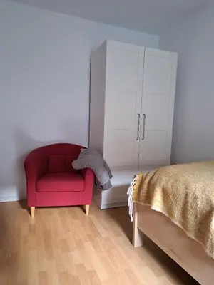 Ein Bett oder Betten in einem Zimmer der Unterkunft Ferienwohnung mit Burgblick