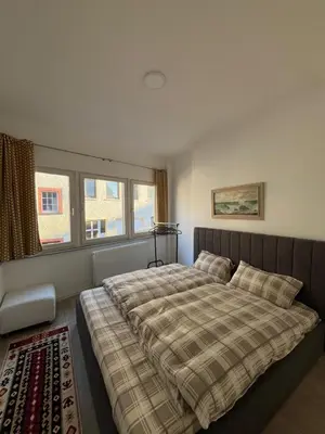 Ein Bett oder Betten in einem Zimmer der Unterkunft Ferienwohnung Andi
