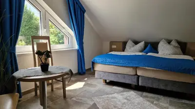 Ein Bett oder Betten in einem Zimmer der Unterkunft Rosenberghof