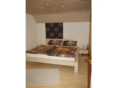 Ein Bett oder Betten in einem Zimmer der Unterkunft Family Sesterheim Comfortable holiday residence