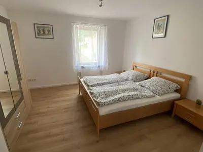 Ein Bett oder Betten in einem Zimmer der Unterkunft Holiday home with 4 rooms and terrace