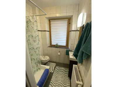 Ein Badezimmer in der Unterkunft Holiday home with 4 rooms and terrace