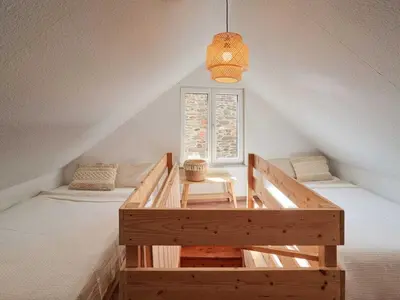 Ein Bett oder Betten in einem Zimmer der Unterkunft Cozy apartment near Mosel - top location - mountain view