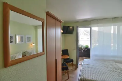 Ein Bett oder Betten in einem Zimmer der Unterkunft Weinhaus Thomas