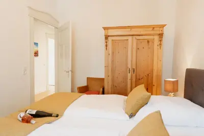 Ein Bett oder Betten in einem Zimmer der Unterkunft St Jakobshof für Moselurlaub mit Familie