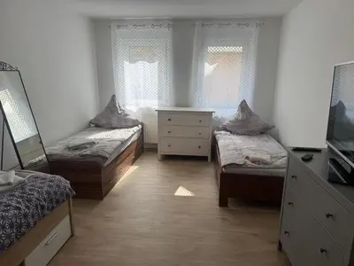 Ein Bett oder Betten in einem Zimmer der Unterkunft WINNINGEN TOP Wohnung