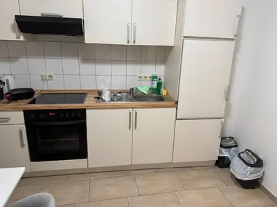 Küche/Küchenzeile in der Unterkunft WINNINGEN TOP Wohnung