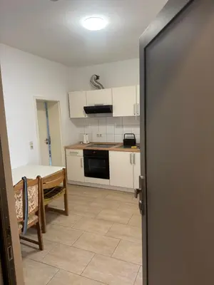 Küche/Küchenzeile in der Unterkunft WINNINGEN TOP Wohnung