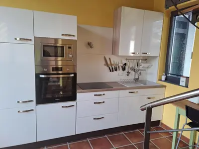 Küche/Küchenzeile in der Unterkunft Haus Burg, Ferienhaus