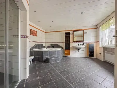 Ein Bett oder Betten in einem Zimmer der Unterkunft Herrenhaus