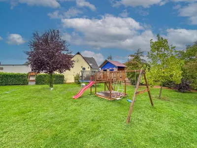 Ein Kinderspielbereich in der Unterkunft Herrenhaus