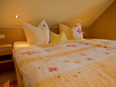 Ein Bett oder Betten in einem Zimmer der Unterkunft Ferienweingut Winnebeck
