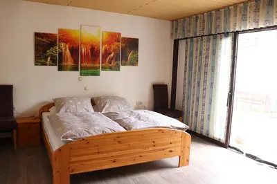 Ein Bett oder Betten in einem Zimmer der Unterkunft Brautrockstube