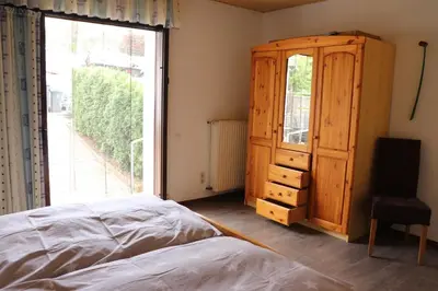 Ein Bett oder Betten in einem Zimmer der Unterkunft Brautrockstube