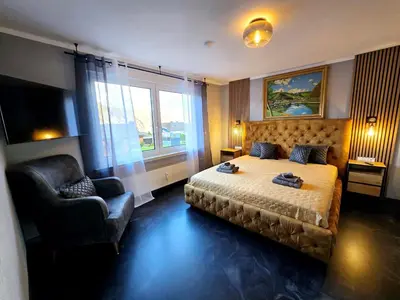 Ein Bett oder Betten in einem Zimmer der Unterkunft Ferienwohnung Krause Deluxe