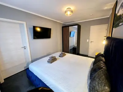 Ein Bett oder Betten in einem Zimmer der Unterkunft Ferienwohnung Krause Deluxe