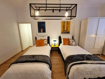 Ein Bett oder Betten in einem Zimmer der Unterkunft Moselperle Güls