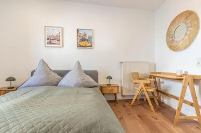 Ein Bett oder Betten in einem Zimmer der Unterkunft Cleveres und gemütliches City-Apartment in Mayen
