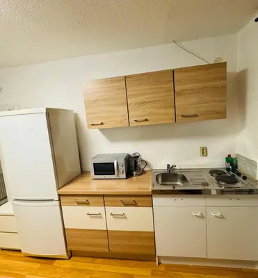 Küche/Küchenzeile in der Unterkunft Unabhängiges Twin-Apartment