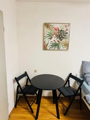 Ein Sitzbereich in der Unterkunft Unabhängiges Twin-Apartment