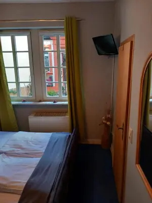 Ein Bett oder Betten in einem Zimmer der Unterkunft Altstadt Oase Bernkastel-kues