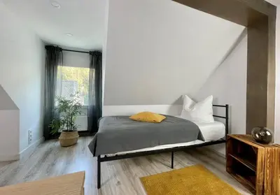Ein Bett oder Betten in einem Zimmer der Unterkunft Charmantes Haus mit Terrasse