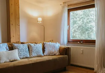 Ein Sitzbereich in der Unterkunft Der 5. Raum - Ferienwohnung und Entspannung
