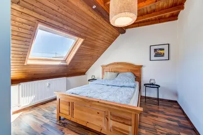 Ein Bett oder Betten in einem Zimmer der Unterkunft Schöne Ferienwohnung in Andernach