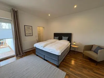 Ein Bett oder Betten in einem Zimmer der Unterkunft Schöne Ferienwohnung in Andernach