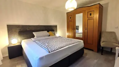 Ein Bett oder Betten in einem Zimmer der Unterkunft Bergblick
