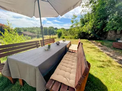Ein Garten an der Unterkunft FeWo I Glücksmomente Bostalsee