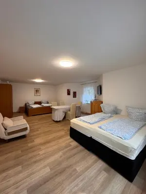 Ein Bett oder Betten in einem Zimmer der Unterkunft Ferienapartment Lidia