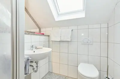Ein Badezimmer in der Unterkunft WeinGut Hermes