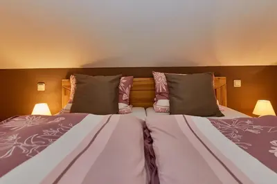 Ein Bett oder Betten in einem Zimmer der Unterkunft WeinGut Hermes