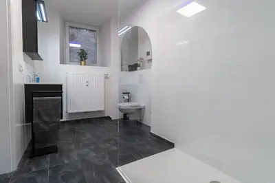 Ein Badezimmer in der Unterkunft Fewomo, Moselzeit Apartment, Stilvolle Fewo für Genießer nähe Schloss