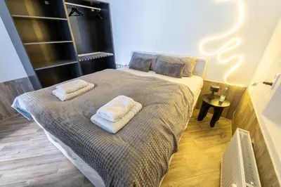 Ein Bett oder Betten in einem Zimmer der Unterkunft Modernes Apartment in Neuwied