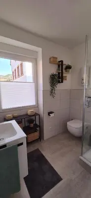 Ein Badezimmer in der Unterkunft NEYSES Apartments - Kylltalperle