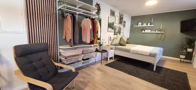 Ein Bett oder Betten in einem Zimmer der Unterkunft NEYSES Apartments - Kylltalperle