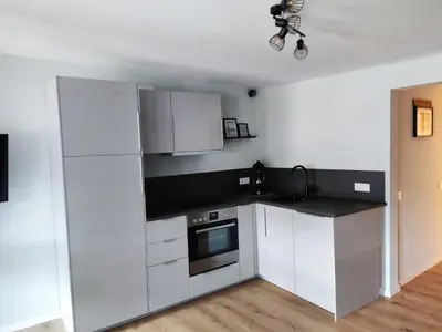 Küche/Küchenzeile in der Unterkunft Weingut & Gästehaus Melchiors