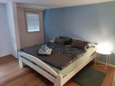 Ein Bett oder Betten in einem Zimmer der Unterkunft FeWo mit Terrasse