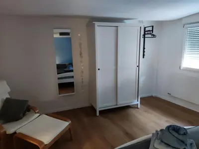Ein Bett oder Betten in einem Zimmer der Unterkunft FeWo mit Terrasse