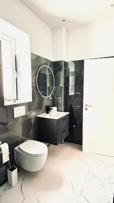 Ein Badezimmer in der Unterkunft Suite Fritz