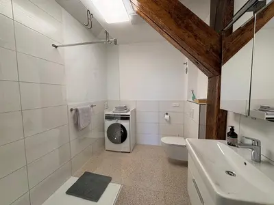 Ein Badezimmer in der Unterkunft Die alte Kellerei