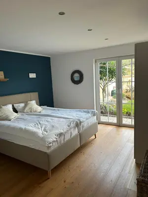 Ein Bett oder Betten in einem Zimmer der Unterkunft Casa Andrea, Ferienwohnung
